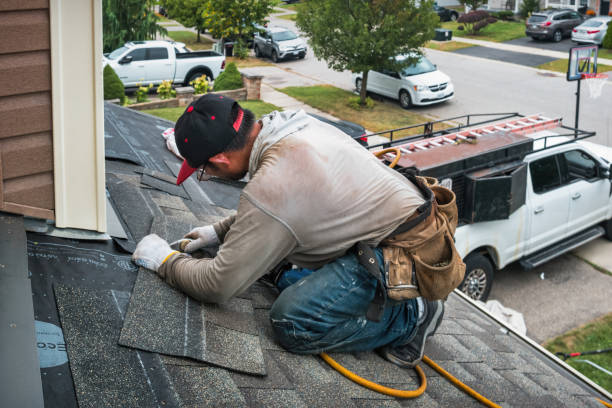 Professional Storm Damage Roof Repair technician working in Warrenville, IL